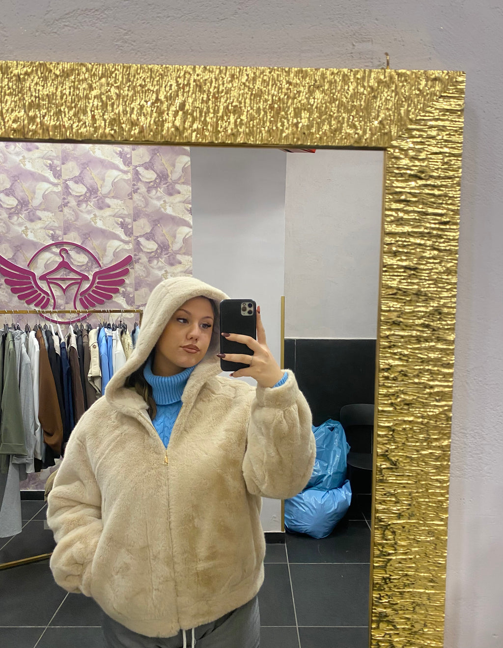 PELLICCETTA CON ZIP E CAPPUCCIO