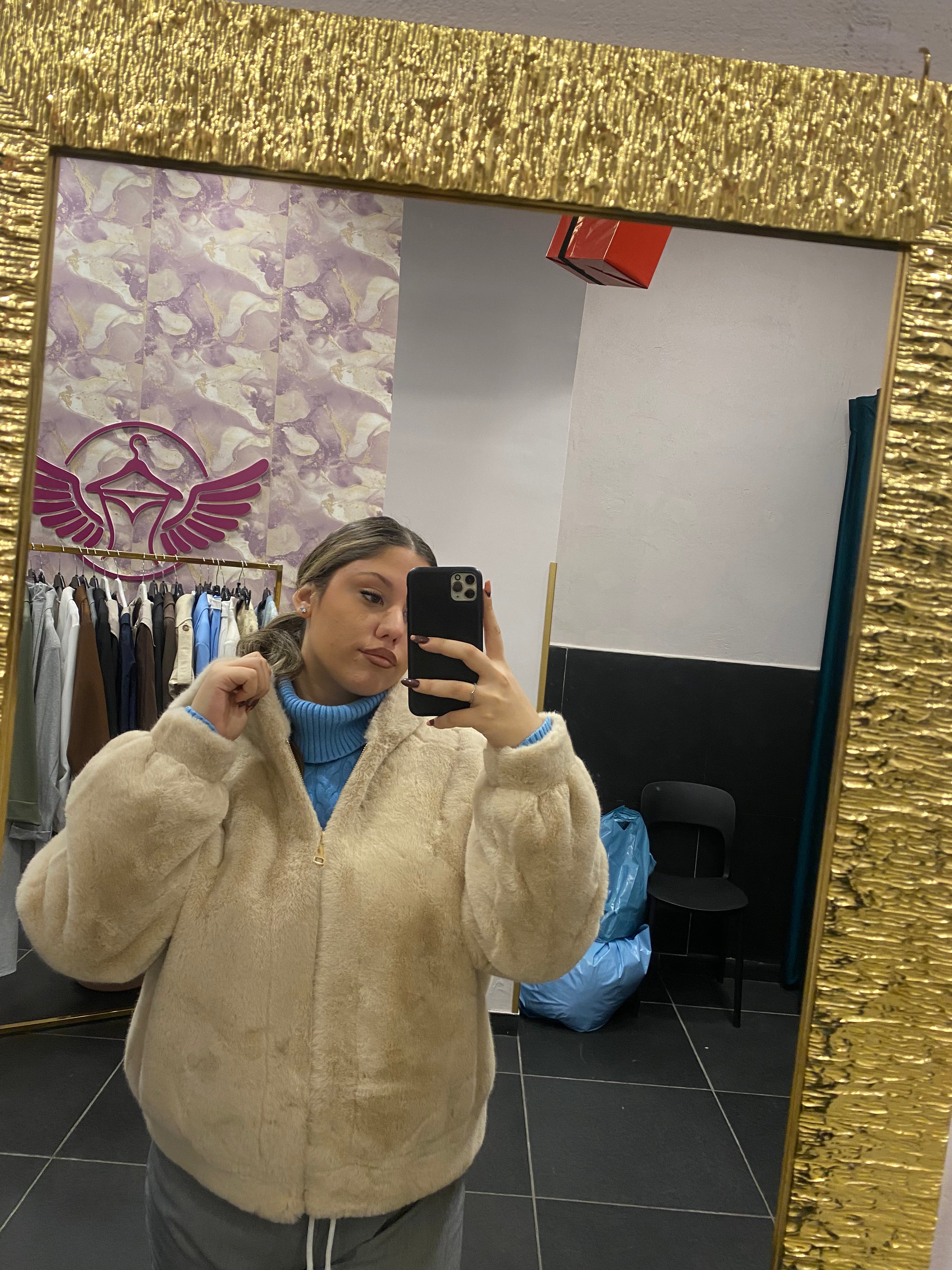 PELLICCETTA CON ZIP E CAPPUCCIO